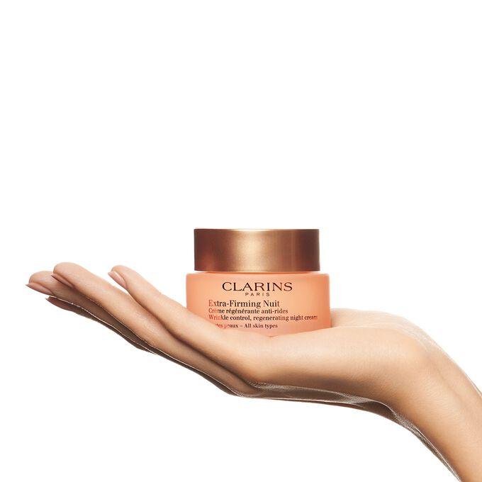 Extra-Firming Night Cream product in hand